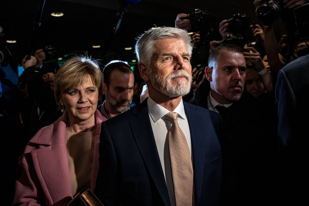 Czech Republic's Petr Pavel with his wife Eva Pavlova arrive at his election headquarters during the run-off vote in Czech presidential election. Photograph: Martin Divisek/EPA