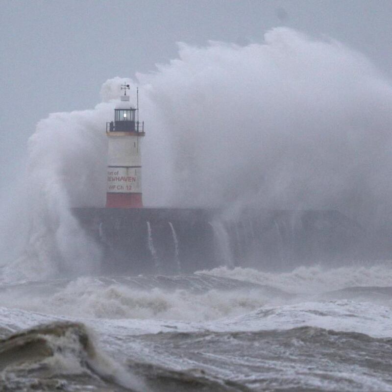 Waves crash against the lighthouse in Newhaven as Storm Ciara pummels the British coast. Photograph: Andrew Matthews/PA Wire