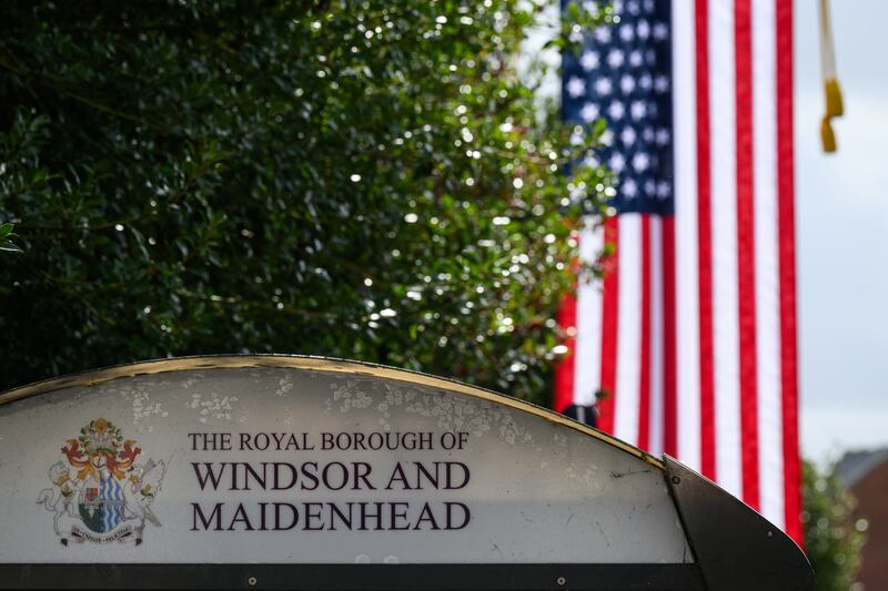 A US banner is displayed in the street outside Windsor Castle. Photograph: Leon Neal/Getty Images