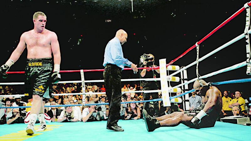 Ireland’s Kevin McBride, left, walks away as referee Joe Cortez stands over Mike Tyson in the sixth round of their heavyweight bout on Saturday, June 1th1, 2005, at the MCI Center in Washington. Photo: Pablo Martinez Monsivais/AP Photo