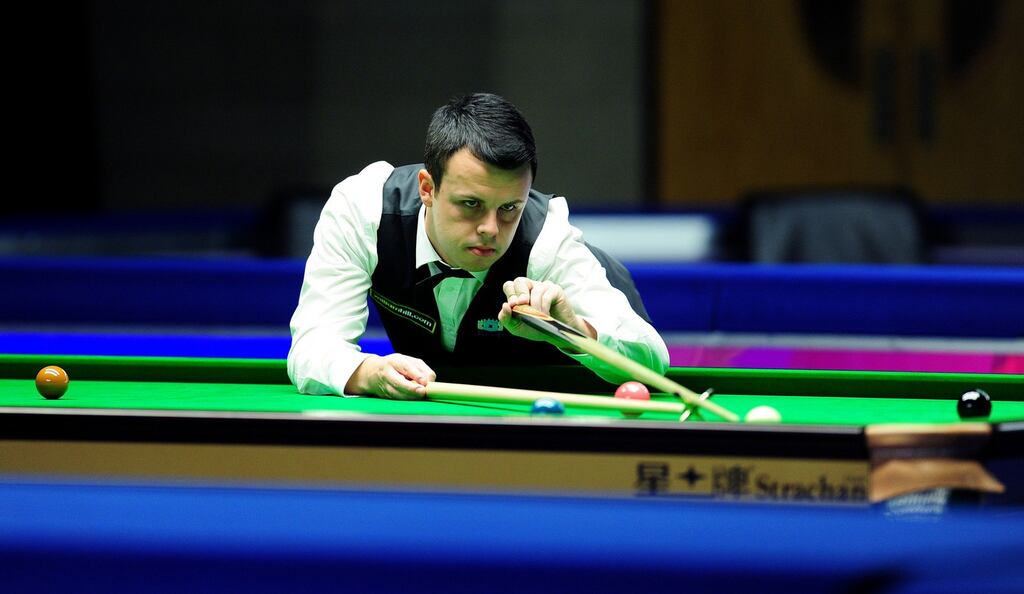 John Astley in action during his first round match in the UK Championship against Ken Doherty at the Barbican Centre in York. Astley defeated the 1997 world champion to advance. Photograph: Anna Gowthorpe/PA Wire