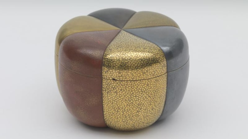 L is for LacquerThere are five gold-lacquer Japanese 19th century incense boxes on show for the first time. The one that charmed the Chester Beatty curators the most when they found it is a box that shows a serene-looking monkey holding a peach. One of the others of this lovely quintet is a box in the shape of a lute, with more musical instruments picked out in gold on the underside of the lid. Another is a box in the form of a bundle of scrolls, all carefully picked out in different colours.