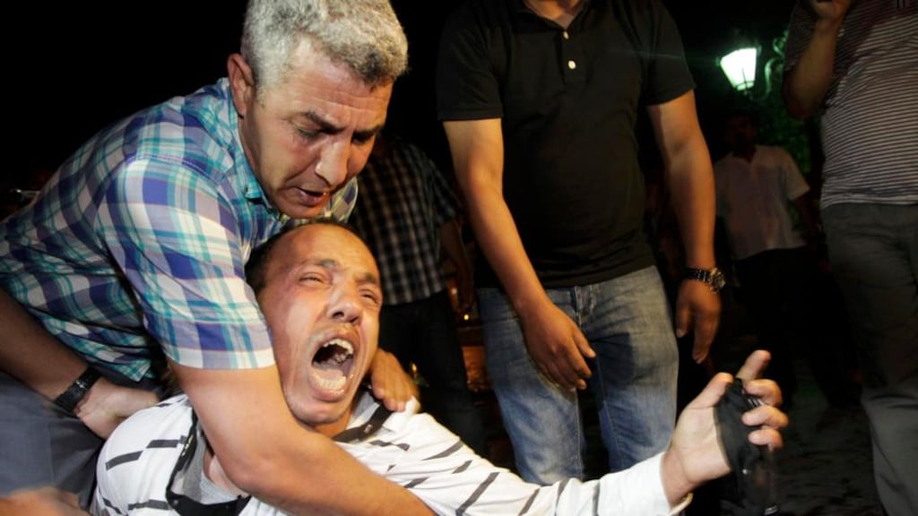 A protester shouts during a demonstration against a royal pardon for a Spanish paedophile, in Rabat. Riot police broke up a protest by hundreds of Moroccan demonstrators late on Friday against the royal pardon for Daniel Vino Galvan. Photograph: Reuters/Stringer
