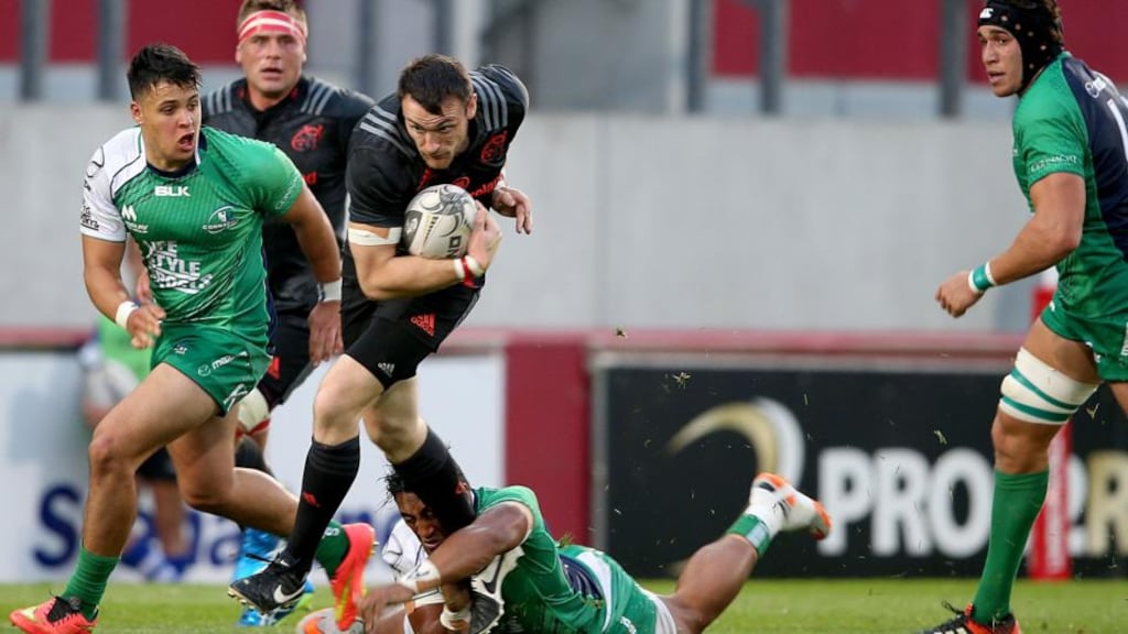 Munster’s Shane Monahan is tackled by Bundee Aki of Connacht during their pre-season friendly at Thomond Park, Limerick. Photograph: I npho