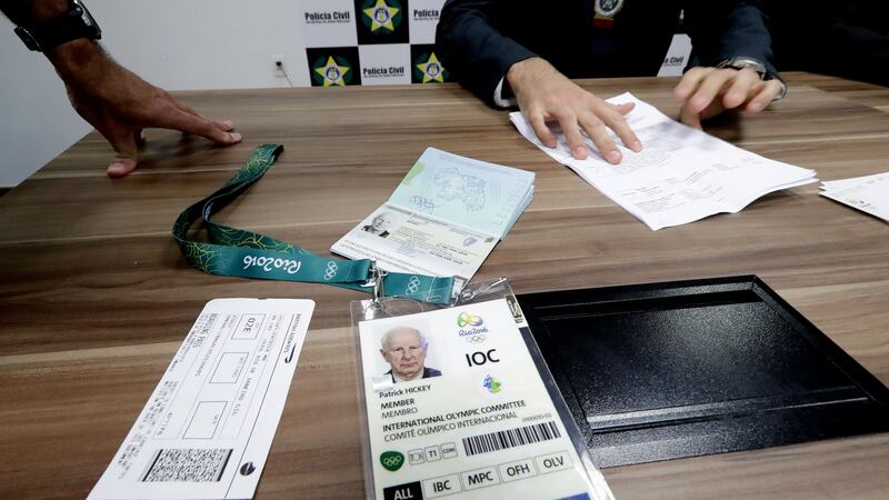 Olympic Council of Ireland president Pat Hickey’s accreditation and travel documents on show during a police press conference in Rio de Janeiro following his arrest. Photograph: INPHO/Morgan Treacy.