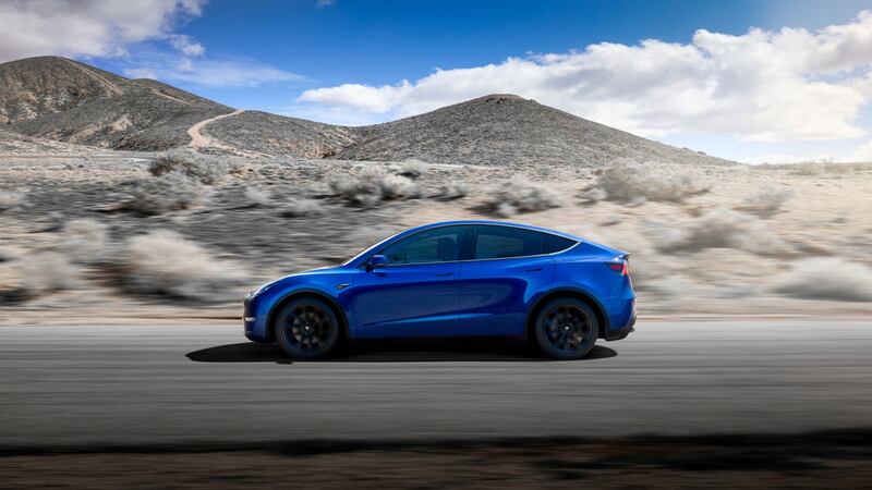 The Model Y will be able to sit seven, using a third collapsible row of seats, and has a glass roof, like the X.