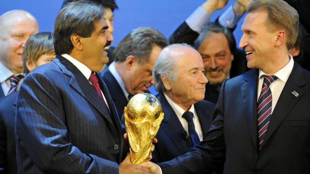 Sheikh Hamad bin Khalifa Al-Thani, Emir of the State of Qatar with Russian deputy prime minster Igor Shuvalov and Fifa president Joseph Blatter (centre) in December 2010 after the announcement of the host nations for the 2018 and 2022 World Cups. Photograph: EPA.