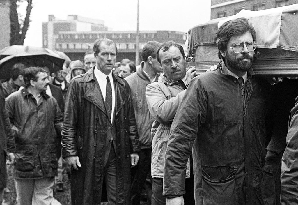 Alfredo 'Freddie' Scappaticci (extreme left of picture/side faced) at the 1988 funeral of IRA man Brendan Davison. Gerry Adams is pictured carrying the coffin. Photograph: Pacemaker Press