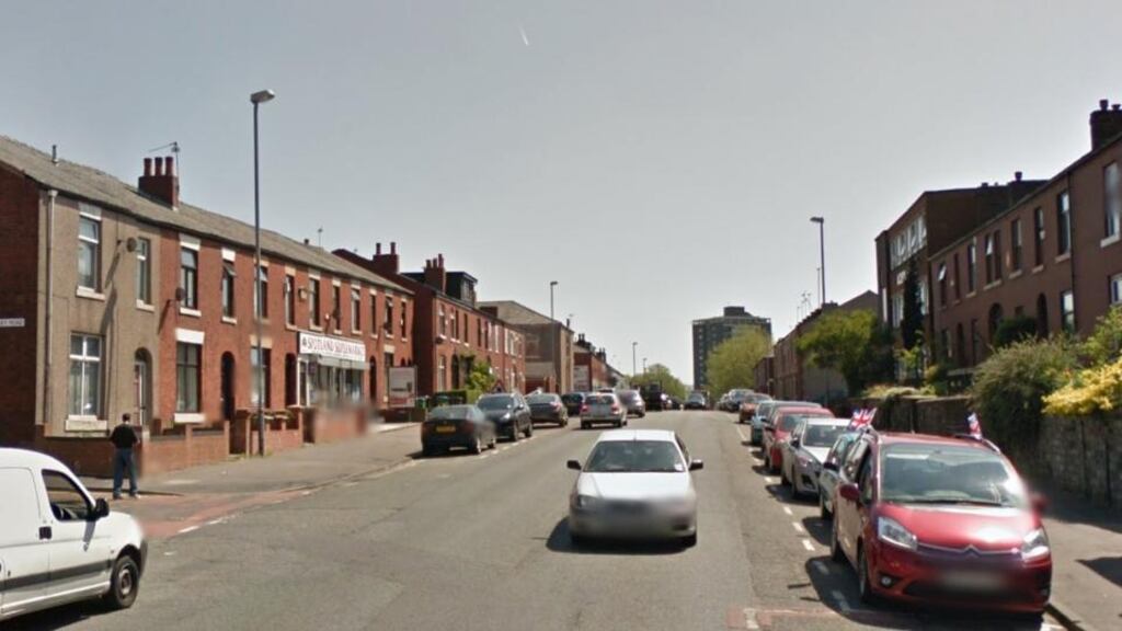 A 90-year-old woman has been dragged off the street and raped in England, police have said. The attack happened on Spotland Road (pictured) in Rochdale, Greater Manchester, as the woman walked to a local shop. Image: Google Maps.