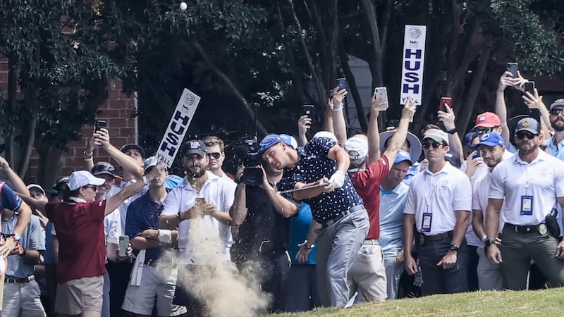 Bryson DeChambeau hits from the rough by the sixth fairway. Photo: Tannen Maury/EPA