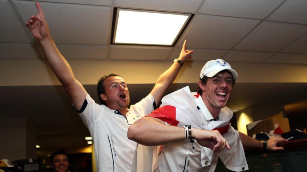 Rory McIlroy (right) and Graeme McDowell celebrate Europe’s Ryder Cup win over the USA in Medinah in 2012. Photograph: Inpho