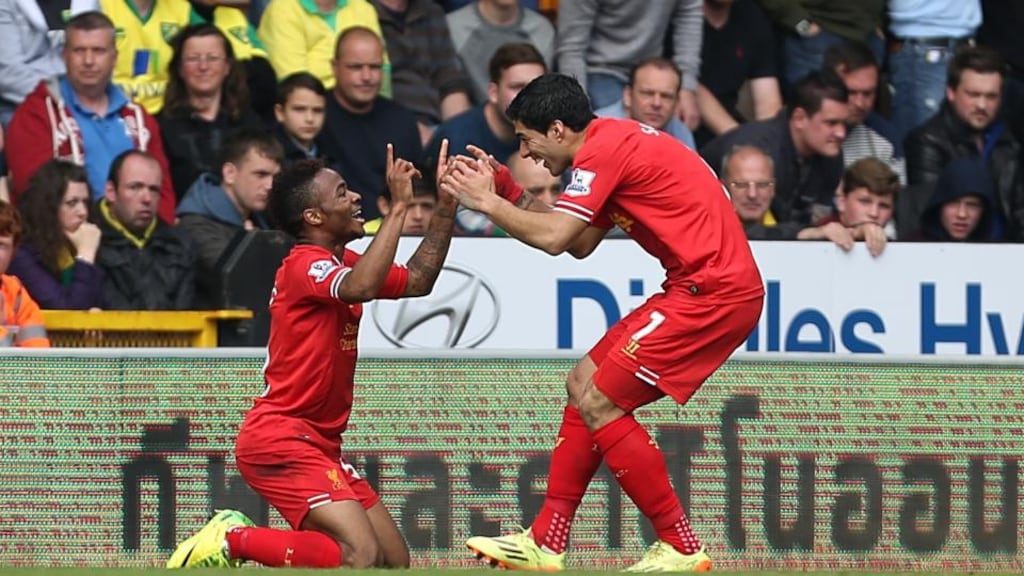 Liverpool’s Luis Suarez (right) celebrates Raheem Sterling’s second against Norwich at Carrow Road last weekend. Photograph: Chris Radburn / PA Wire