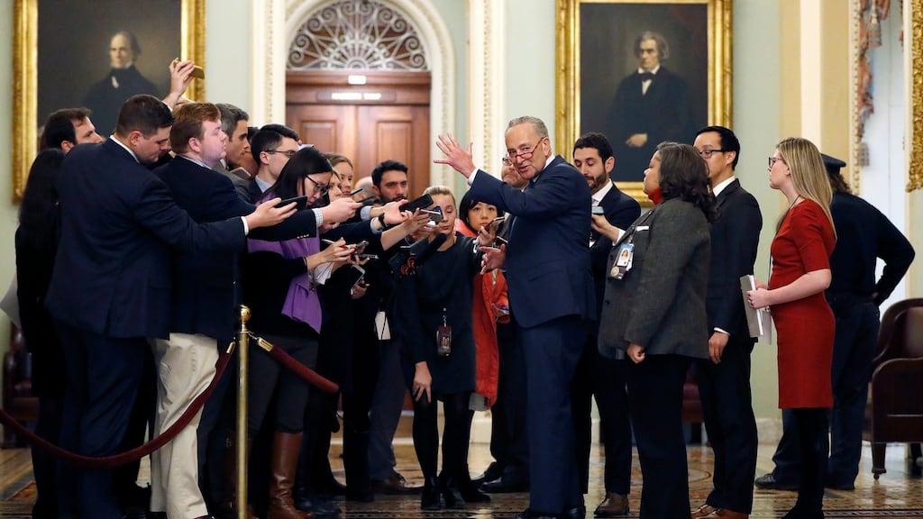 Senate minority leader Chuck Schumer talks to reporters outside the Senate chamber at the Capitol in Washington, DC. Photograph: Julio Cortez/AP Photo