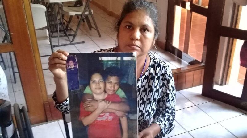 Margaret Munguía, in Managua, holding a picture of herself with her son Javier, who was killed in May 2018. Photograph: Michael McCaughan