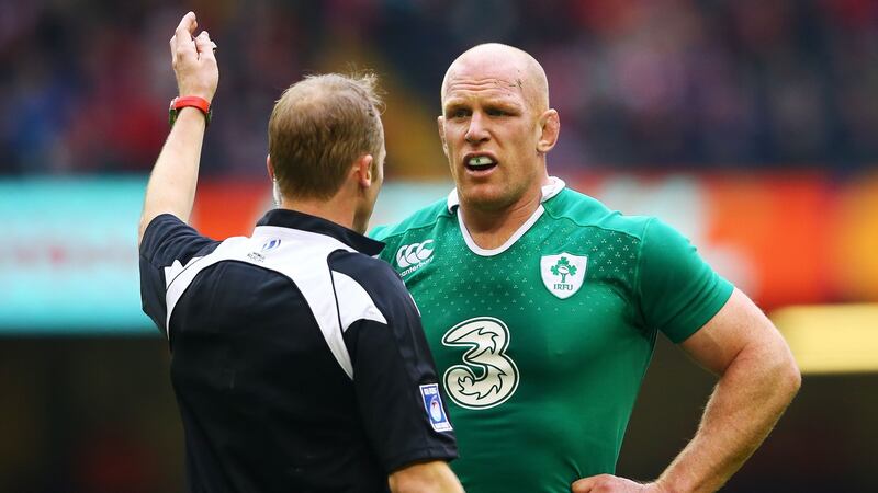 Ireland’s Paul O’Connell with referee Wayne Barnes. Photograph: Cathal Noonan/Inpho