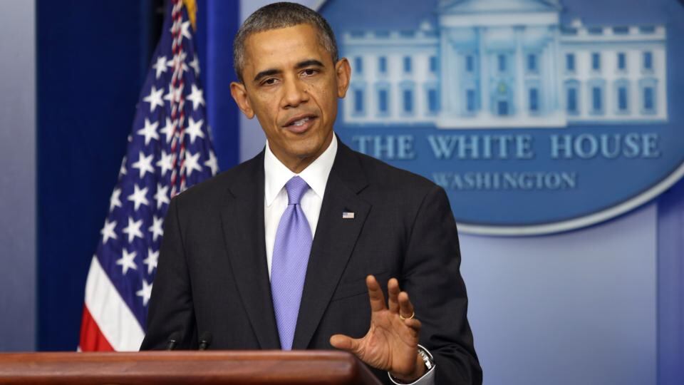 US President Barack Obama gestures as he speaks during a news conference in the White House briefing room in Washington, DC. Mr Obama urged Congress to move forward with work on a new immigration law, a farm bill and a “sensible budget” with the deadlock over funding the government and raising the debt ceiling broken for now. Photograph: Martin H. Simon/Pool via Bloomberg