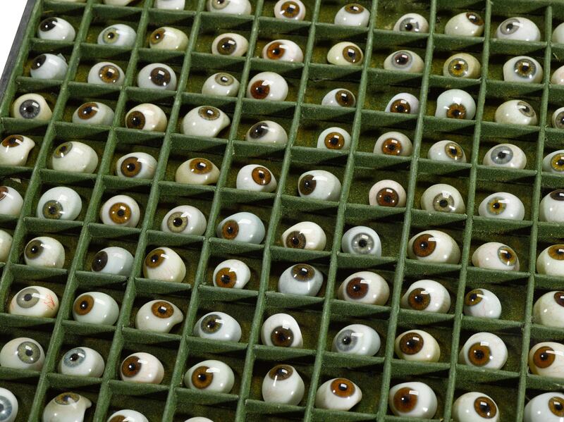 A cased set of prosthetic handblown-glass eyes, early 20th century.
