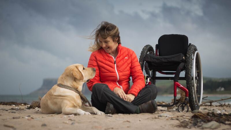 Chris Slavin and her service dog, Earle, on one of their many visits to Ireland. Photograph: Lyndsey G. Kidd