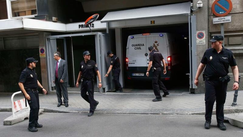 A police van believed to be carrying Luis Barcenas, former treasurer for the ruling People’s Party, leaves court. Photograph: Juan Medina/Reuters