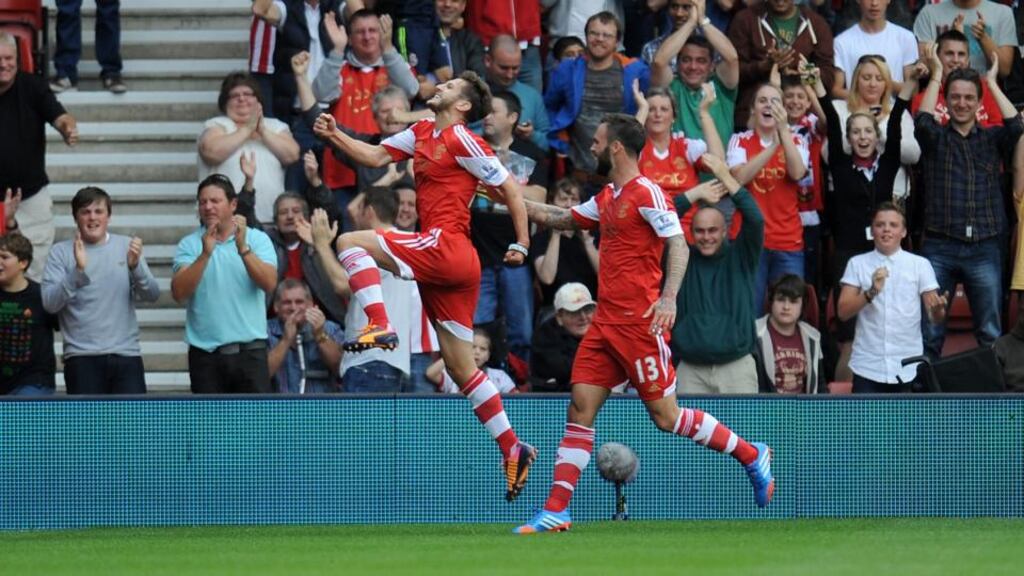Southampton’s Adam Lallana celebrates scoring the opening goal of the Premier League game against Swansea at St Mary’s. Photograph: Clive Gee/PA