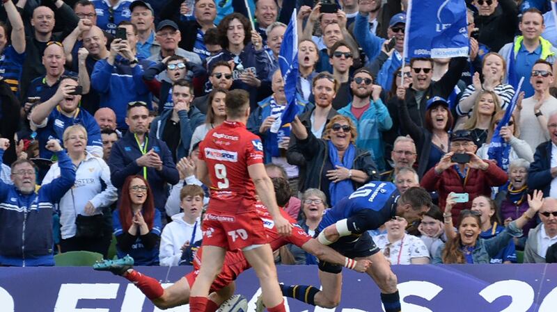 Johnny Sexton scores a try against Scarlets. His performance was another reminder that when it comes to semi-finals, experience counts. Photograph: Barry Cronin/AFP