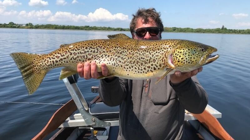 Basil Shields with the 11lb 3oz trout he caught in Ballynalty Bay on the Corrib in May.