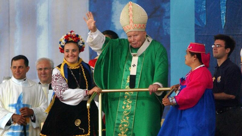 Pope John Paul II waves to the crowd at the opening of a public mass at Downsview Park in July 2002 during the conclusion of World Youth Day in Toronto, Canada. Photograph: Spencer Platt/Getty Images