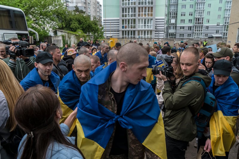 Ukrainian prisoners of war arrive at a reception point after they were released from Russian captivity. Photograph: Brendan Hoffman/New York Times