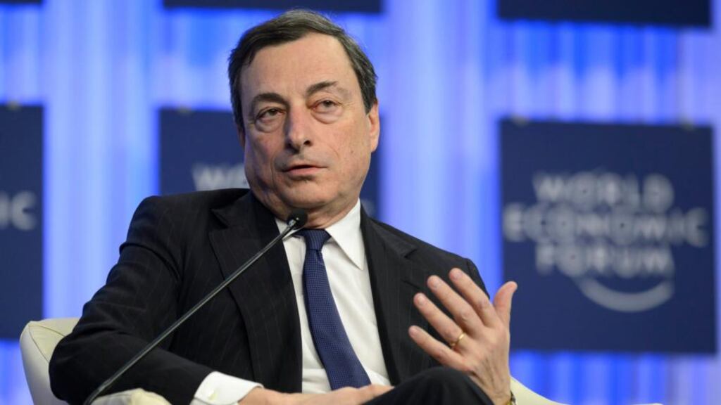 ECB president Mario Draghi speaking during a panel session on the third day of the World Economic Forum in Davos yesterday. Photograph; Laurent Gillieron/EPA