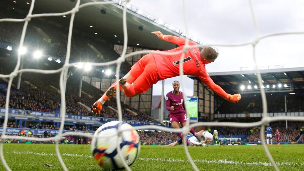Manchester City’s Raheem Sterling scores their third goal. Photograph: Action Images via Reuters/Carl Recine
