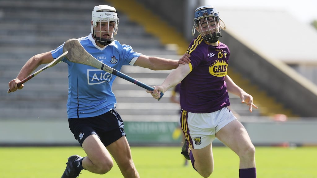 Alex O’Neill of Dublin in action against Wexford’s AJ Redmond during the Electric Ireland Leinster MHC semi-final at Innovate Wexford Park. Photograph: Lorraine O’Sullivan/Inpho