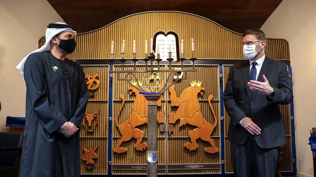 UAE ambassador Sultan Al Ali and Israeli ambassador Ophir Kariv celebrate the eighth night of Chanukah at the synagogue in Terenure, Dublin. Photograph: Crispin Rodwell