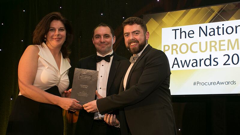 Chris Mooney, Codex Office Solutions presents the CSR Initiative of the Year award to Anna-Marie Curran, A&L Goodbody & Patrick Sweeney, SEI.