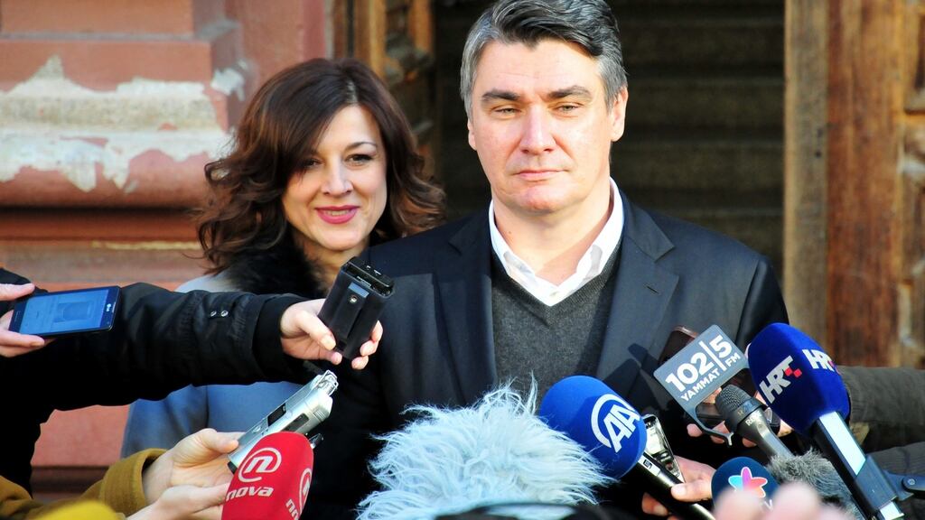 Croatian prime minister Zoran Milanovic and his wife, Sanja, after casting their votes in Zagreb. Milanovic’s SDP is accused of being soft on migrants. Photograph: EPA/Igor Kupljenik