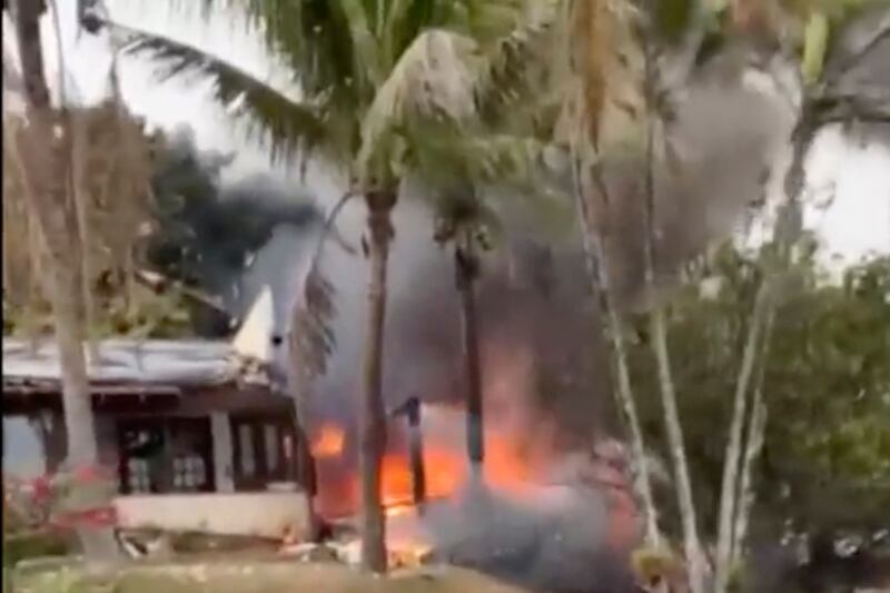 Fire coming from a plane that crashed by a home in Vinhedo, Sao Paulo state, Brazil. Photograph: Felipe Magalhaes Filho/AP