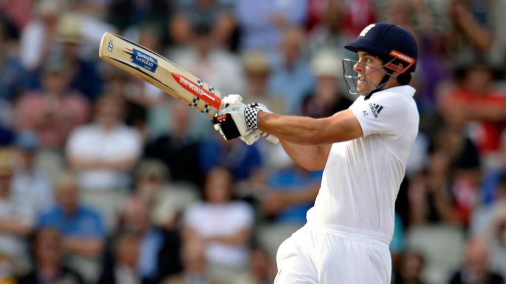 England’s Alastair Cook hits the ball in the air and is caught by India’s Pankaj Singh during the Fourth Test at Old Trafford in Manchester. Photo: Philip Brown/Reuters
