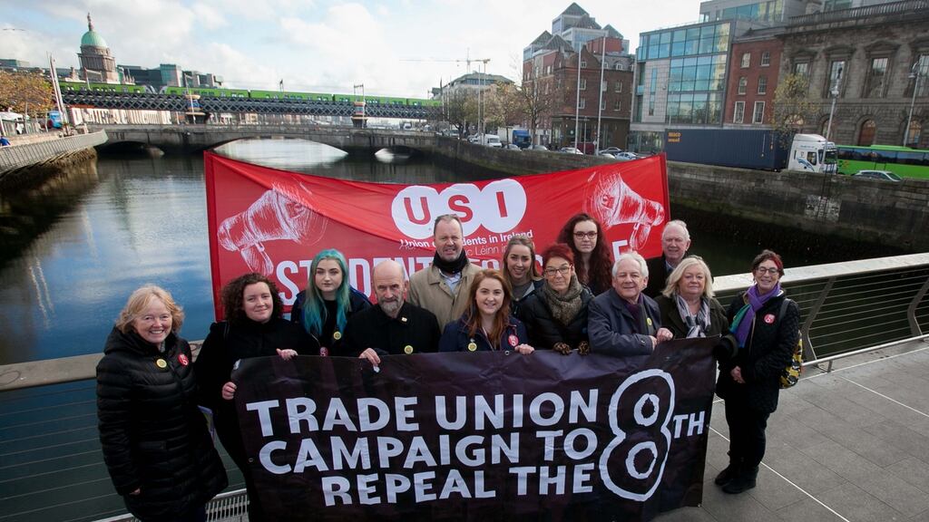 Trade union members, students and activists at a trade union campaign for a referendum to repeal the Eighth Amendment was held on the Rosie Hackett Bridge in Dublin city. Photograph: Gareth Chaney Collins