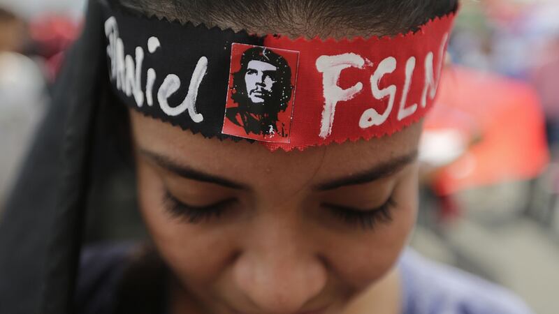 A supporter of Nicaraguan president Daniel Ortega takes part in a pro-government rally  in Managua on Wednesday. Photograph: Inti Ocon/AFP/Getty Images