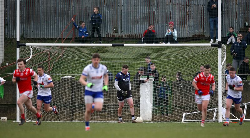 Sam Mulroy scores a penalty for Louth past Monaghan goalkeeper Rory Beggan. Photograph: Leah Scholes/Inpho