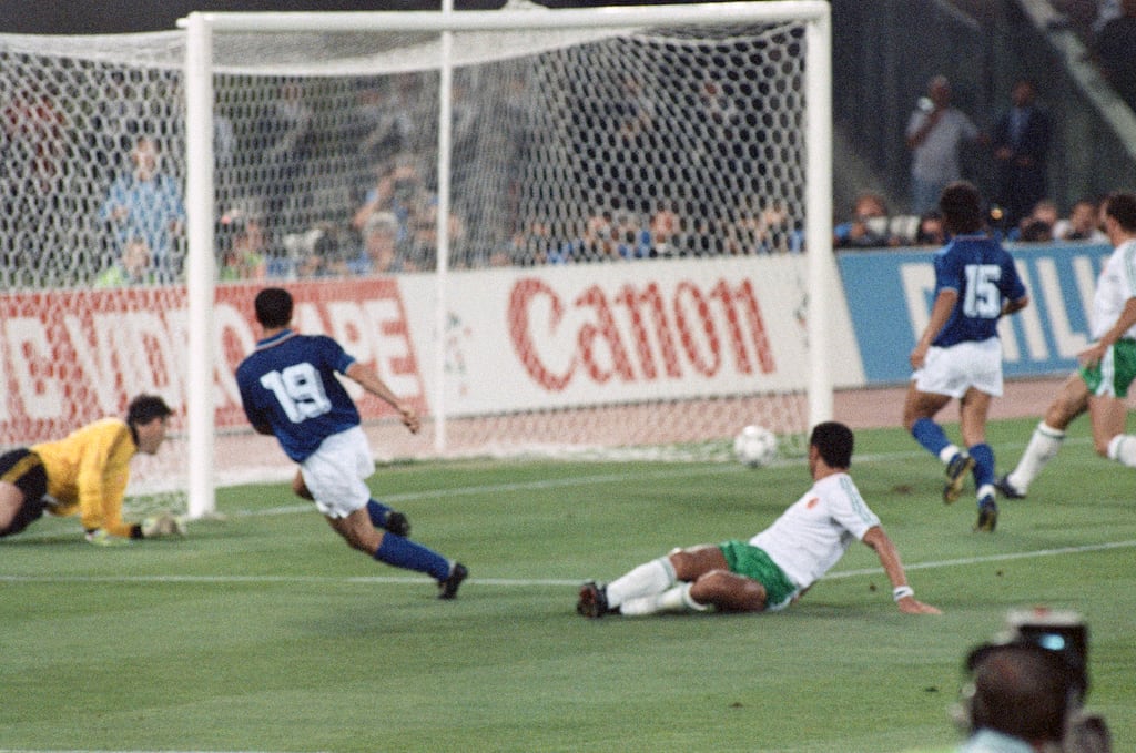 Italian striker Toto Schillaci scores the only goal of the game as Irish defender Paul McGrath looks on, June 30th, 1990. Photograph: Albert Cooper/Mirrorpix via Getty