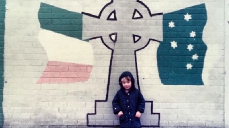 Darran Anderson as a child in front of the now demolished Rossville Flats in Derry