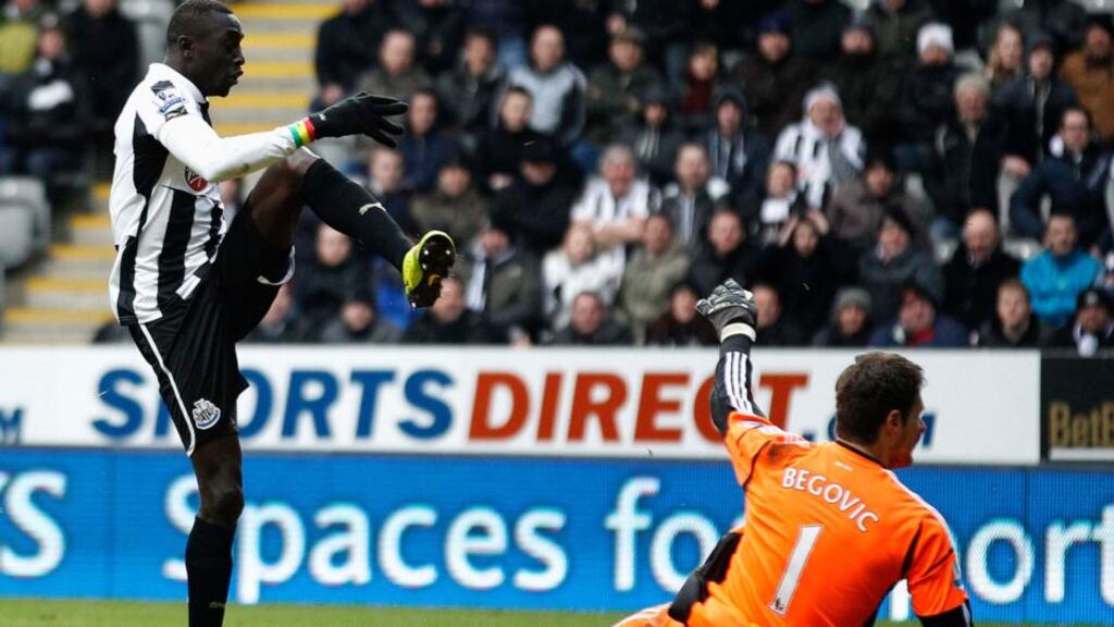 Newcastle United's Papiss Cisse scores the winning goal against Stoke City. Photograph: David Moir/Reuters