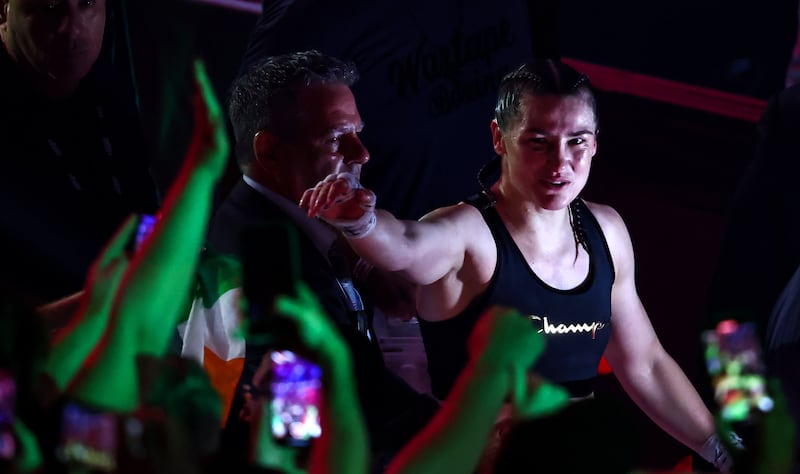 Katie Taylor waves to fans after defeating Amanda Serrano. Photograph: Gary Carr/Inpho