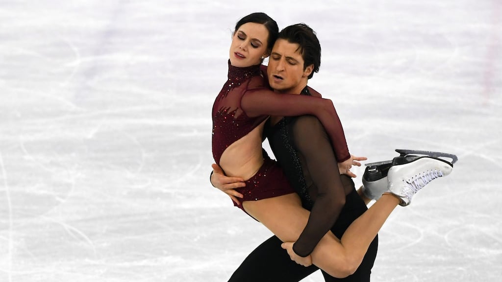 Tessa Virtue and Scott Moir of Canada compete during the free dance portion of the ice dance event as they claimed the golf medal. Photograph: James Hill/New York Times