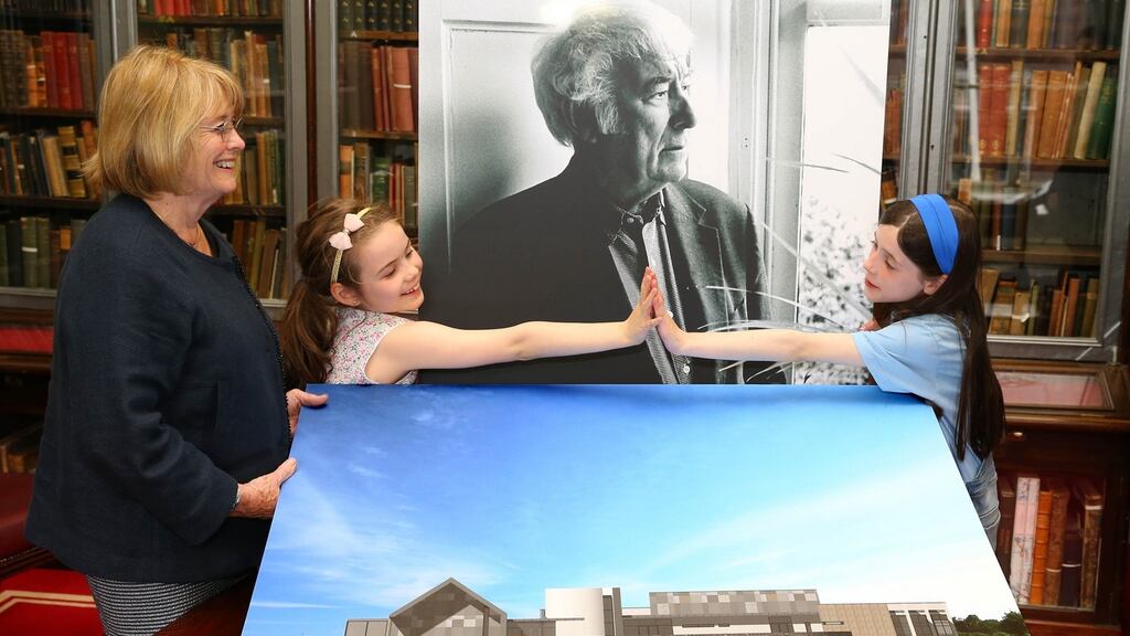 Marie Heaney (wife of the Nobel Laureate Seamus Heaney) and her granddaughters Aibhin (eight) and Anna Rose (nine) Seamus Heaney HomePlace a new arts and literary centre which will mark the poet’s life and work in Bellaghy, Co Derry. Photograph: Marc O’Sullivan.