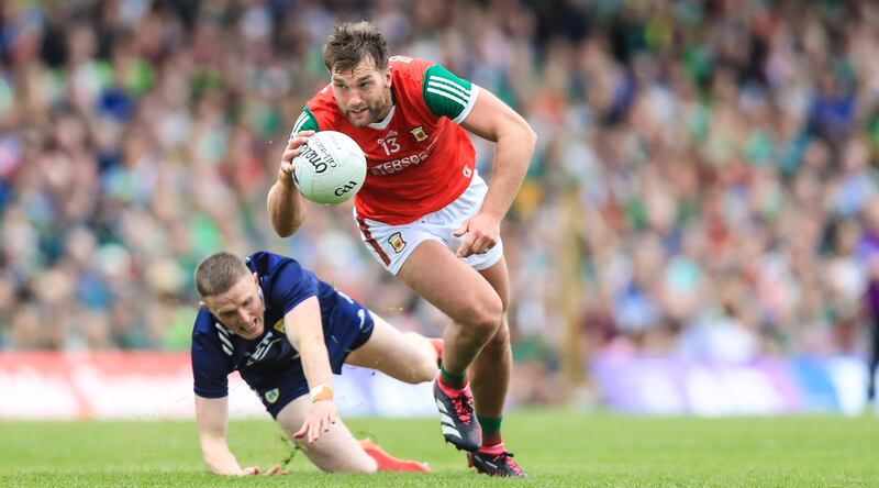 Mayo’s Aidan O'Shea with Jason Foley of Kerry in Killarney. O'Shea provides a strong focal point for the Mayo forwards. Photograph: Evan Treacy/Inpho