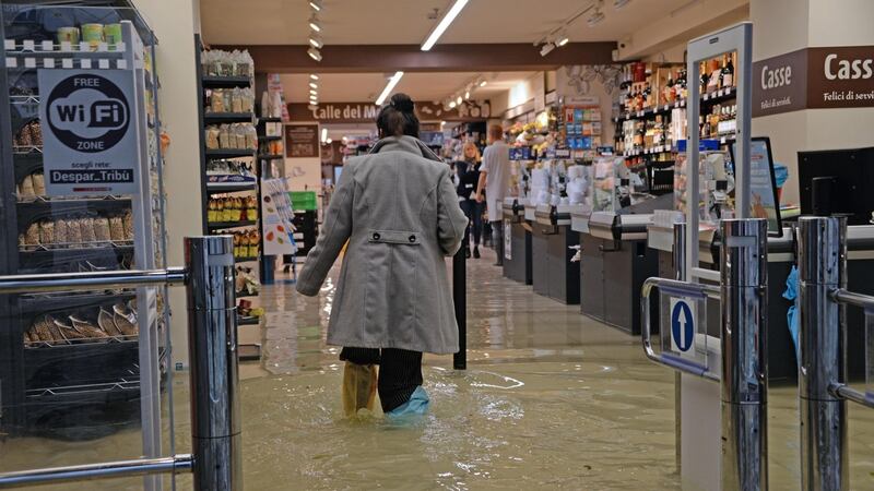 A flooded supermarket that stayed open during the high water levels in Venice on November 15th. Photograph: Andrea Merola/EPA