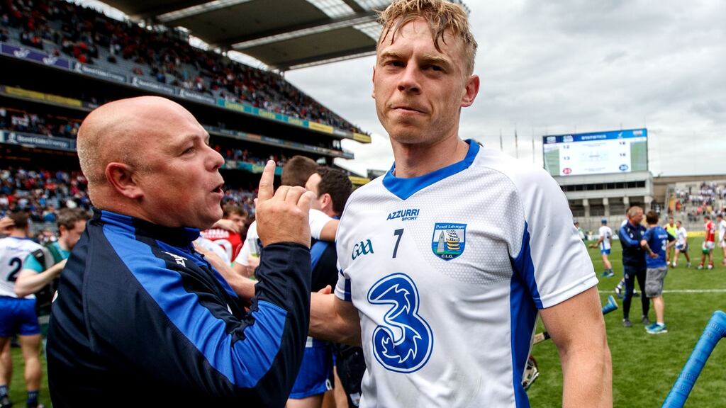 Waterford manager Derek McGrath celebrates with Philip Mahony after victory over Cork in the All-Ireland semi-final. Photograph: James Crombie/Inpho