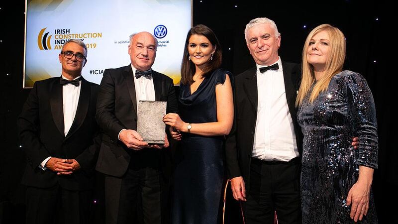 Jenny Hill, Client Services Manager, Cpl presents the Commercial Project of the Year – Small award to the John Sisk & Son team.