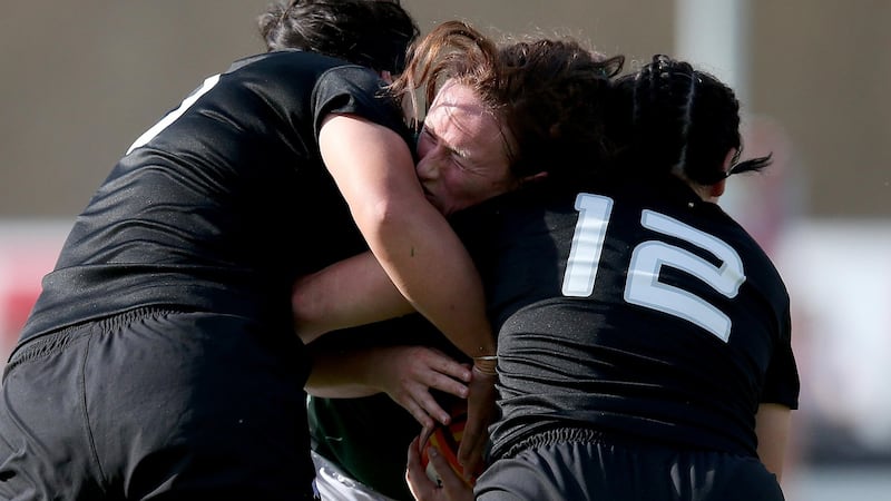 Ireland’s Ailis Egan is tackled by Kathleen Wilton and Amiria Rule of New Zealand. Photograph: Dan Sheridan/Inpho